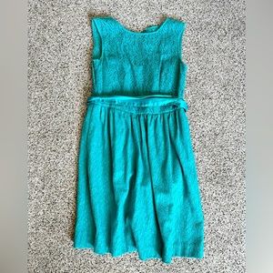 Teal sleeveless 🌟cocktail dress 👗with pockets and satin bow.